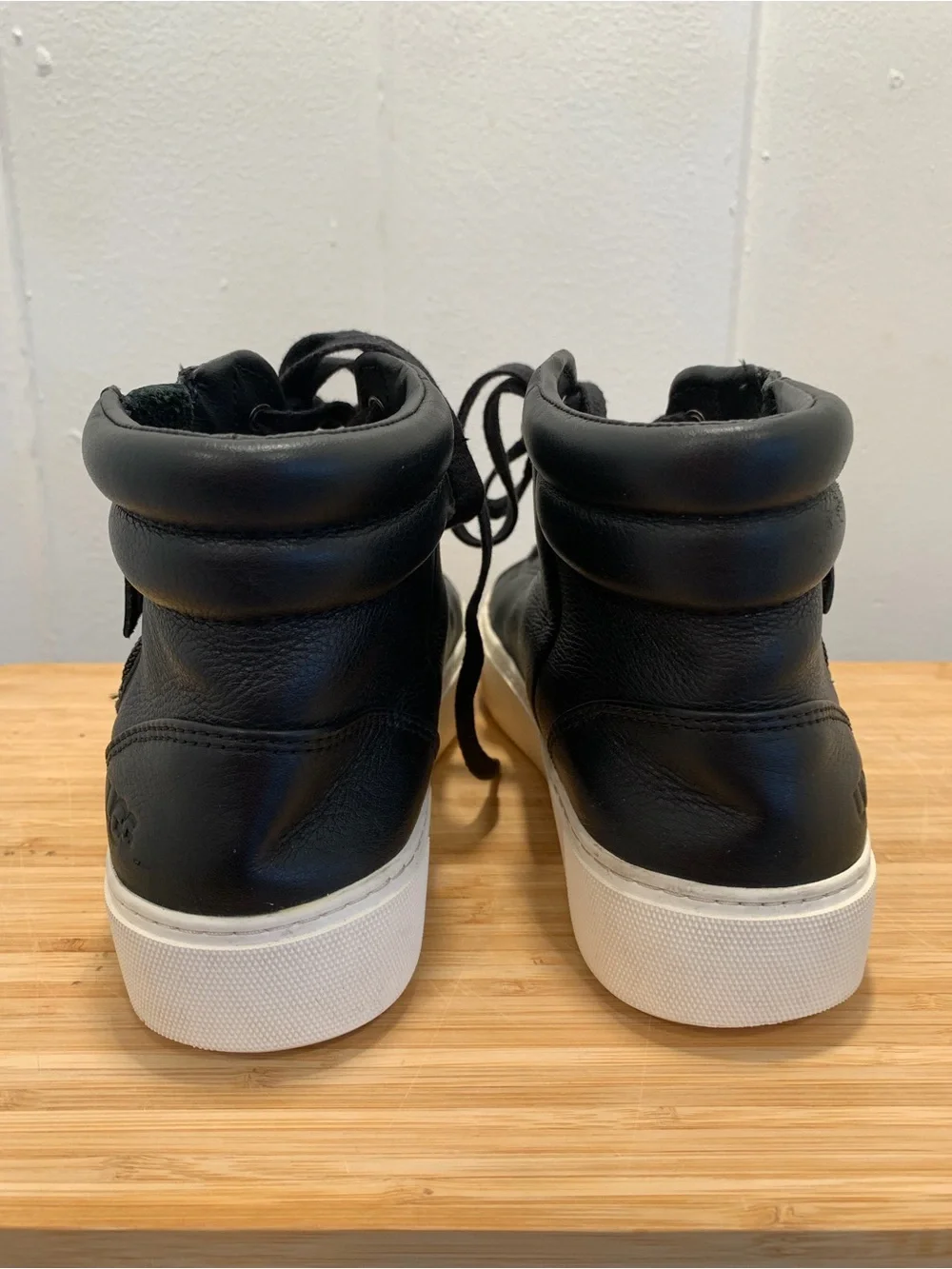 UGG Olli Black Leather High-Top Sneakers